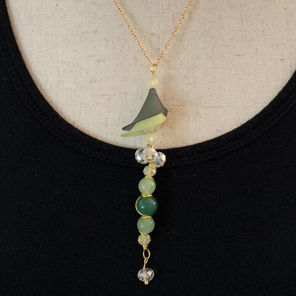 Lady with hat‎ necklace.Lucite flowers and crystals